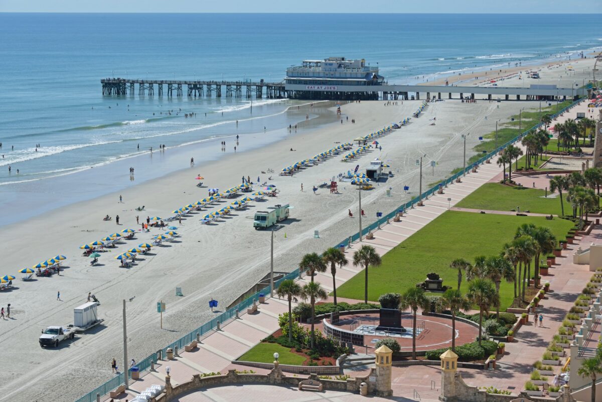An aerial photo of the pier and beach at Daytona Beach.